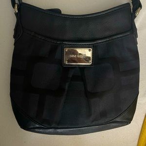 A small nine west black bag